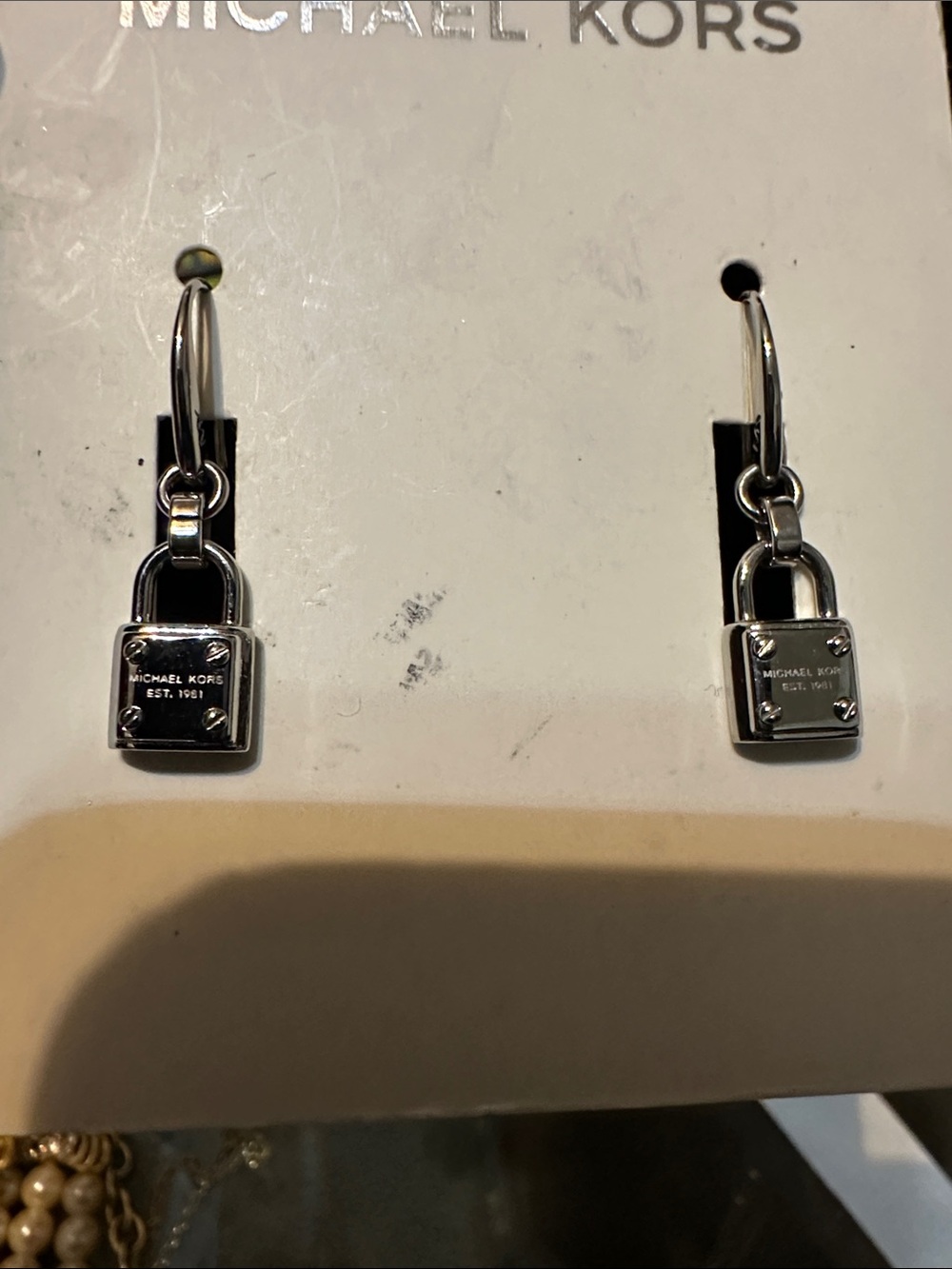 Silver Michael kors pad lock earrings